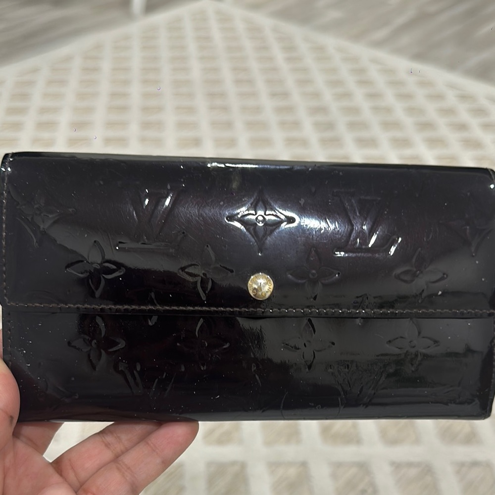 Louis Vuitton Brown Wallet with Embossed Design